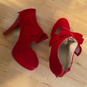 red suede-like heels with back zipper - 4" heel - size 6